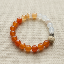 Load image into Gallery viewer, Essential oil bracelet with orange and white beads, cork diffuser bead, silver filigree bead