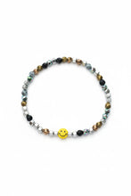 Load image into Gallery viewer, Metallic beaded streth bracelet with a yellow happy face bead