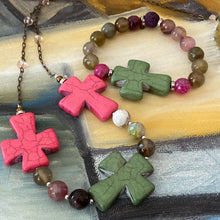 Load image into Gallery viewer, Essential Oil Bracelet, Large Cross Focal, Surrounded by Agates in shades of pinks, purples and greens