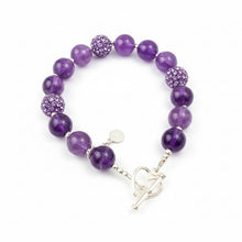 Load image into Gallery viewer, Amethyst and purple rhinestone bracelet with a sterling silver heart clasp against a white background.