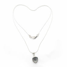 Load image into Gallery viewer, Sterling Silver 24 inch necklace with an iridesceent heart-shaped pendant on a white background