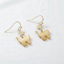 Load image into Gallery viewer, Cat-shaped earrings with star details on a white background