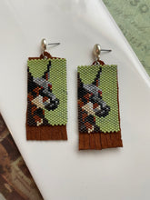 Load image into Gallery viewer, Handwoven Doberman Post Earrings, Beaded in Green, Beige, Browns, and Black || Backed with Suede Fringe
