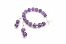 Load image into Gallery viewer, Amethyst  and purple rhinestone bracelet with a sterling silver heart clasp and coordinating earrings on a white background.
