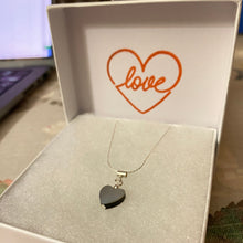 Load image into Gallery viewer, Jewelry box with a heart-shaped pendant and 'love' card inside.
