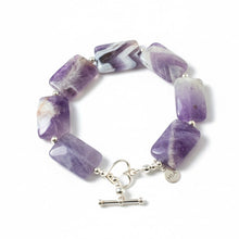 Load image into Gallery viewer, Rectangular purple amethyst beaded bracelet with silver heart clasp on a wooden surface
