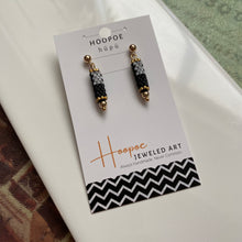 Load image into Gallery viewer, &quot;Anamorphic&quot; Beaded Black and White Cylinder Post Earrings
