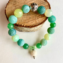 Load image into Gallery viewer, Breathe deep your favorite essential oil (1-2 drops applied to white Lava bead charm) all day long. Rich green Aventurine and Agate beads and chips surround a silver Filigree bead.  Type: Diffuser Stretch Bracelet Size: 6 Bead sizes: 8mm, 10mm
